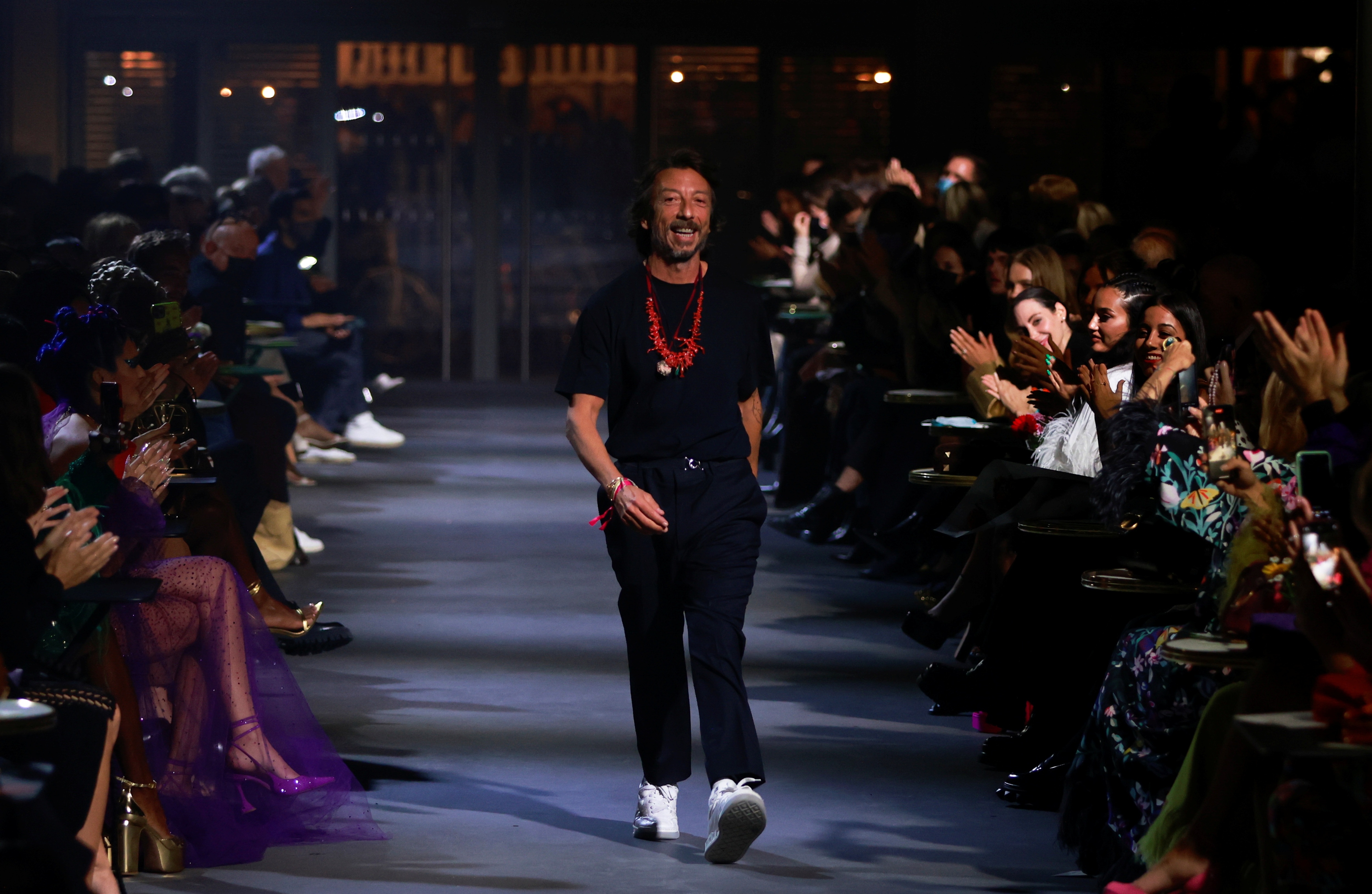 Designer Pierpaolo Piccioli appears at the end of his Spring/Summer 2022 women's ready-to-wear collection show&nbsp;(REUTERS)