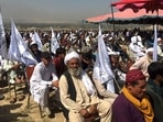 Taliban supporters attend an open air rally in a field in Kabul on October 3, 2021. (Photo by Hoshang HASHIMI / AFP)(AFP) Taliban supporters attend an open air rally in a field in Kabul on October 3, 2021. (Photo by Hoshang HASHIMI / AFP)(AFP)