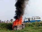A vehicle set ablaze in Lakhimpur Kheri on Sunday.(ANI) A vehicle set ablaze in Lakhimpur Kheri on Sunday.(ANI)