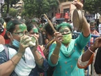 TMC supporters jubilate outside party supremo and West Bengal Chief Minister Mamata Banerjee's residence at Kalighat, during counting of votes for the Bhawanipur Assembly by-polls, in Kolkata.(PTI) TMC supporters jubilate outside party supremo and West Bengal Chief Minister Mamata Banerjee's residence at Kalighat, during counting of votes for the Bhawanipur Assembly by-polls, in Kolkata.(PTI)