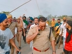 The incident happened earlier in the day at Tikonia-Banbirpur road when the farmers were protesting against the visit of Uttar Pradesh deputy chief minister Keshav Prasad Maurya in Banbirpur village. (PTI Photo) The incident happened earlier in the day at Tikonia-Banbirpur road when the farmers were protesting against the visit of Uttar Pradesh deputy chief minister Keshav Prasad Maurya in Banbirpur village. (PTI Photo)