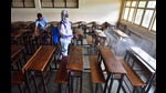 Workers of the Madhavrao Bhagwat High School clean and sanitize the classrooms after Maharashtra government announces reopening of schools from October 4, in Mumbai on September 29. (Satish Bate/HT PHOTO) Workers of the Madhavrao Bhagwat High School clean and sanitize the classrooms after Maharashtra government announces reopening of schools from October 4, in Mumbai on September 29. (Satish Bate/HT PHOTO)