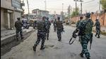 Security personnel preparing for a search operation after a civilian was killed in a shopping complex allegedly by terrorists in Karan Nagar, in Srinagar, Saturday. (PTI) Security personnel preparing for a search operation after a civilian was killed in a shopping complex allegedly by terrorists in Karan Nagar, in Srinagar, Saturday. (PTI)