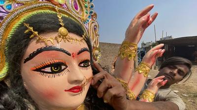 A majority of Durga Puja organisers in the city have scaled down the size of pandals and idols to prevent huge gathering of devotees. (HT FILE) A majority of Durga Puja organisers in the city have scaled down the size of pandals and idols to prevent huge gathering of devotees. (HT FILE)