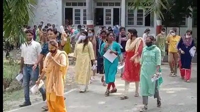 Candidates coming out of a centre after appearing in the nursing exam in Prayagraj on Sunday. (HT PHOTO)