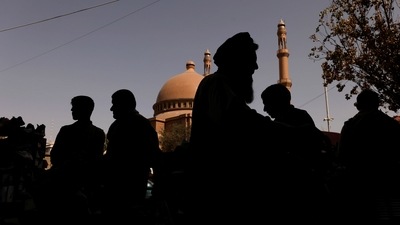 People stand near Abdul Rahman Mosque in Kabul, Afghanistan. (REUTERS)