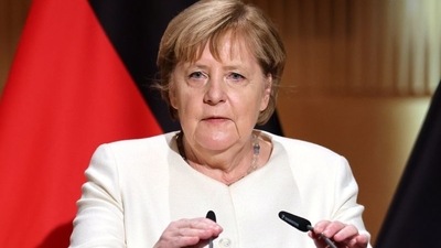 Outgoing German Chancellor Angela Merkel speaks on the occasion of the 31st anniversary of Germany's Unification Day, in the city of Halle, Germany. (Jan Woitas/Pool via REUTERS) (REUTERS)