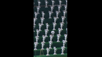 The image shows the robots at a baseball game in Japan. (Instagram/@guinnessworldrecords)