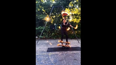 The image shows the artist performing with fire. (Instagram/@ripleysbelieveitornot)