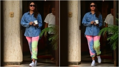 Kareena chose a simple yet classy ensemble for the outing. It included a loose fitted shirt and colourful pants. With her trendy look, the actor gave us tips on how to mix and match tie-dye print with denim. (HT Photo/Varinder Chawla)