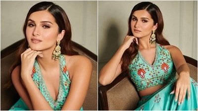 Tara chose open side-parted sleek tresses, nude pink lip shade, blushed cheeks, shimmery eye shadow with winged liner, mascara-laden lashes, and glowing skin to complete her glam. What do you think of her ethnic ensemble? (Instagram/@punitbalana)