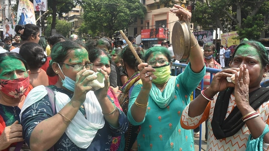 TMC supporters jubilate outside party supremo and West Bengal Chief Minister Mamata Banerjee's residence at Kalighat, during counting of votes for the Bhawanipur Assembly by-polls, in Kolkata.(PTI)