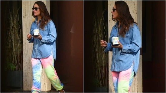 Keeping the vibe of her look minimal, Kareena teamed her day-out ensemble with white chunky lace-up sneakers and sunglasses. The actor left her luscious locks open in a side parting and opted for a no-makeup look.(HT Photo/Varinder Chawla)