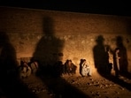 The shadow of Taliban fighters casts over drug users detained at a police station in Kabul.(AP) The shadow of Taliban fighters casts over drug users detained at a police station in Kabul.(AP)