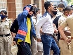 Actor Sharukh Khan's son Aryan Khan being taken to hospital in Mumbai on Monday. Actor Sharukh Khan's son Aryan Khan being taken to hospital in Mumbai on Monday.
