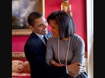 The image shows former US President Barack Obama and former First Lady Michelle Obama.