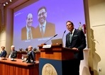 Thomas Perlmann, secretary of the Nobel Assembly and the Nobel Committee, announces the winners of the 2021 Nobel Prize in Physiology or Medicine David Julius and Ardem Patapoutian (seen on the screen) during a press conference at the Karolinska Institute in Stockholm, Sweden on October 4, 2021. (TT News Agency/Jessica Gow via REUTERS)