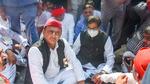 Samajwadi Party president Akhilesh Yadav along with party MP Prof Ram Gopal Yadav stage a protest, after he was not allowed by the police to go to Lakhimpur, in Lucknow, Monday. (PTI) Samajwadi Party president Akhilesh Yadav along with party MP Prof Ram Gopal Yadav stage a protest, after he was not allowed by the police to go to Lakhimpur, in Lucknow, Monday. (PTI)