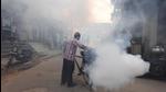 A civic employee fumigates a road in the capital. Dengue cases in Delhi usually peak around October. (Raj K Raj/HT Photo) A civic employee fumigates a road in the capital. Dengue cases in Delhi usually peak around October. (Raj K Raj/HT Photo)