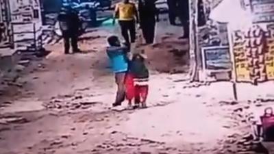A CCTV footage of the murder, shows the plumber slitting the throat of the woman shopkeeper in Dabri, after the latter asked him to pay for cigarettes. The local residents caught the plumber, Dilip, and beat him up. (Video grab)