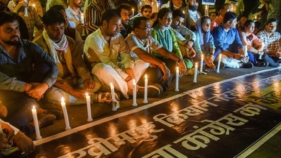 Members of Youth Congress during a candle light March against the Lakhimpur Kheri violence incident, in New Delhi on October 4, 2021. (ANI Photo) Members of Youth Congress during a candle light March against the Lakhimpur Kheri violence incident, in New Delhi on October 4, 2021. (ANI Photo)