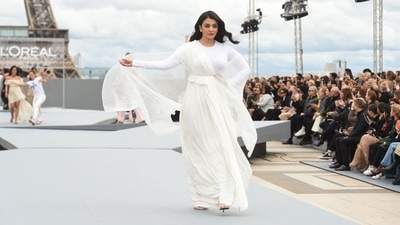 Many international names, including actor Aishwarya Rai Bachchan, walked the ramp at the Trocadero, in Paris, for L'Oreal. She wore a creation from their Spring-Summer 2022 Ready-to-Wear collection and was truly a vision to behold. (AFP) Many international names, including actor Aishwarya Rai Bachchan, walked the ramp at the Trocadero, in Paris, for L'Oreal. She wore a creation from their Spring-Summer 2022 Ready-to-Wear collection and was truly a vision to behold. (AFP)