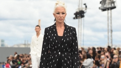 British actress Helen Mirren also walked the ramp for L'Oreal during the Paris Fashion Week. She wore a creation from the brand's Spring-Summer 2022 Ready-to-Wear collection. Serving boss lady vibes, the actor wore an embellished black power suit and styled it with OTT eye make-up, sleek bun and statement-making heels. (AFP) British actress Helen Mirren also walked the ramp for L'Oreal during the Paris Fashion Week. She wore a creation from the brand's Spring-Summer 2022 Ready-to-Wear collection. Serving boss lady vibes, the actor wore an embellished black power suit and styled it with OTT eye make-up, sleek bun and statement-making heels. (AFP)