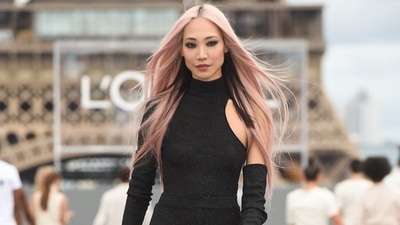 South Korean-US model Soo Joo Park presents a creation for L'Oreal on the sidelines of the Paris Fashion Week Spring-Summer 2022 Ready-to-Wear collection. She wears a shimmering all-black creation with intricately placed cut-outs. (AFP) South Korean-US model Soo Joo Park presents a creation for L'Oreal on the sidelines of the Paris Fashion Week Spring-Summer 2022 Ready-to-Wear collection. She wears a shimmering all-black creation with intricately placed cut-outs. (AFP)