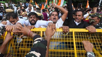Congress supporters protest against the Uttar Pradesh government over violence in Lakhimpur Kheri, outside Uttar Pardesh Bhawan, in New Delhi on Monday. (Hindustan Times) Congress supporters protest against the Uttar Pradesh government over violence in Lakhimpur Kheri, outside Uttar Pardesh Bhawan, in New Delhi on Monday. (Hindustan Times)