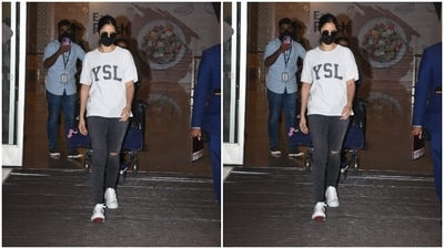 Late on Sunday, Tiger, Katrina and Tara were spotted by paparazzi coming back to Mumbai, in their comfiest outfits. And white seems to be the go-to colour for all the stars when they want a good comfortable fly. Katrina sported a white t-shirt from the house of Yves Saint Laurent, the French luxury store expertising in designs of shoes, leathers and accessories for men and women. Katrina paired her t-shirt with grey ripped jeans and white sneakers. (HT Photos/Varinder Chawla)
