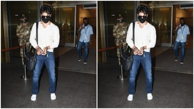Tiger Shroff’s airport fashion looks always has our heart. The actor, for Sunday, chose the classic white and blue combination to fly back to the city. He dressed up in a white full-sleeved t-shirt and paired it with blue denims. (HT Photos/Varinder Chawla)