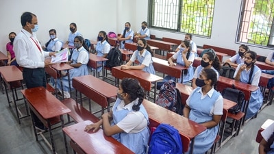 Mumbai: Students attend a class after schools reopend for 8th to 10th standard students in Mumbai, Monday, &nbsp;Schools in Maharashtra's Pune district also reopened for physical classes on Monday. (PTI)