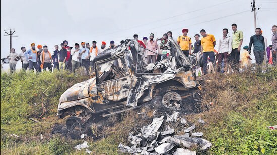 One of the vehicles that allegedly ran over the farmers and killed them, was set ablaze by an angry mob in Tikunia, Lakhimpur Kheri, Uttar Pradesh, on Monday. (HT photo/Deepak Gupta)