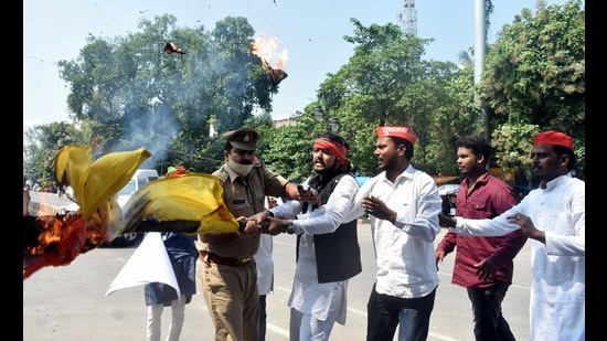 SP workers staging a protest in Prayagraj on Monday. (Ht photo)