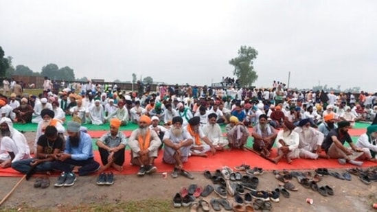 Farmers mourn the death of fellow farmers killed on Sunday.(AP)