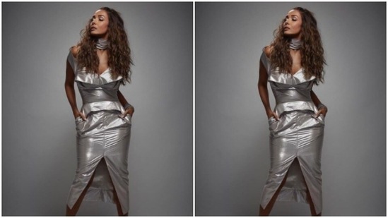 Malaika aptly accessorised her look for the photoshoot with silver jewellery from the house of Mozzati and Ayana Silver Jewellery. She opted for a statement silver choker to complement her attire and added a heavy silver bracelet to her left hand.(Instagram/@manekaharisinghani)
