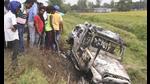 Villagers watch a burnt car which allegedly ran over and killed farmers on Sunday, at Tikonia village in Lakhimpur Kheri. (AP Photo) Villagers watch a burnt car which allegedly ran over and killed farmers on Sunday, at Tikonia village in Lakhimpur Kheri. (AP Photo)