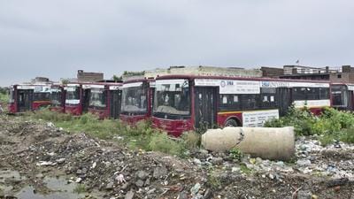 Defunct buses dumped in the land on Hambran road in Ludhiana on Tuesday. The Ludhiana MC authorities have failed to find a solution for 37 city buses worth ₹17 crore that have been lying in a dilapidated condition in the depot on the Tajpur road for the last over eight years. (Gurpreet Singh/HT) Defunct buses dumped in the land on Hambran road in Ludhiana on Tuesday. The Ludhiana MC authorities have failed to find a solution for 37 city buses worth ₹17 crore that have been lying in a dilapidated condition in the depot on the Tajpur road for the last over eight years. (Gurpreet Singh/HT)