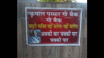 Ahead of the Himachal bypoll, posters were put up in Fatehpur calling Kripal Parmar an outsider and referring to his roots in Punjab and not Himachal. (HT Photo) Ahead of the Himachal bypoll, posters were put up in Fatehpur calling Kripal Parmar an outsider and referring to his roots in Punjab and not Himachal. (HT Photo)