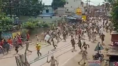 The Chhattisgarh police imposed curfew in Kawardha town of Kabirdham district after violence broke out over flags put up by people from two communities. Police use cane charge to disperse the groups of people who had gathered. (Twitter/ChhattisgarhBJP)