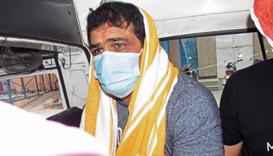 India's Olympic wrestling medallist Sushil Kumar sits inside a vehicle after he was arrested by police over alleged involvement in the murder of a fellow wrestler.&nbsp; ( AFP)