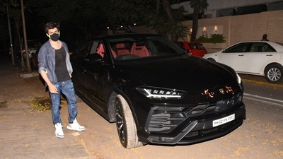 Kartik Aaryan poses with his Lamborghini. Kartik Aaryan poses with his Lamborghini.