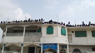 Students gather at the roof of Lal Masjid during an altercation with Pakistan security forces. (Twitter) Students gather at the roof of Lal Masjid during an altercation with Pakistan security forces. (Twitter)