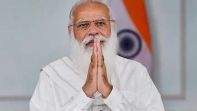 PM Modi will distribute e-property cards to 1,71,000 beneficiaries on the occasion. (HT File Photo)