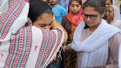 Sushmita Dev with Lakhimpur victims' families. (Twitter/AITCOfficial) Sushmita Dev with Lakhimpur victims' families. (Twitter/AITCOfficial)