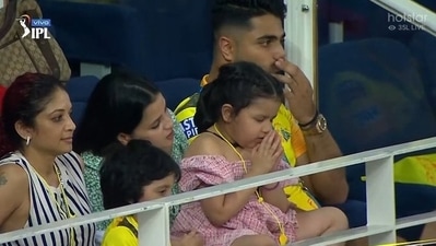 A camera caught a glimpse of MS Dhoni's daughter Ziva Dhoni in the stands with her hands folded.&nbsp; (Twitter)