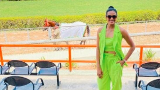 The set that PV Sindhu wore to the event included a neon green crop top, high-rise trousers and a sleeveless jacket.(Instagram/@pvsindhu)
