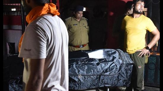 The body of Gurvinder Singh, who was killed in an incident involving protesting farmers in Lakhimpur Kheri, is seen at a mortuary in Lakhimpur. (AFP Photo)