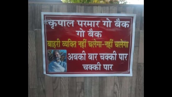 Ahead of the Himachal bypoll, posters were put up in Fatehpur calling Kripal Parmar an outsider and referring to his roots in Punjab and not Himachal. (HT Photo)