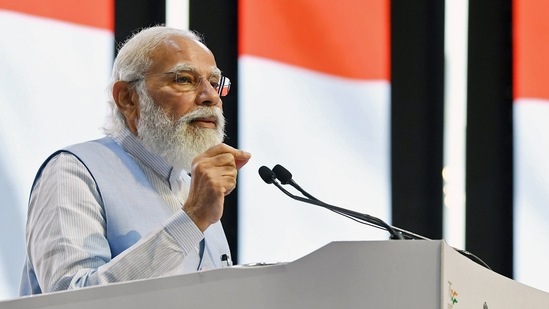Prime Minister Narendra Modi addressing at the inauguration of the 'Azadi@75 - New Urban India: Transforming Urban Landscape Conference-cum-Expo', in Lucknow on Tuesday. (ANI)